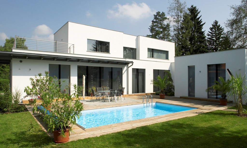 Modernes Ziegelhaus mit Flachdach und Garage – energieeffizient gebaut von Binder Bau im Burgenland